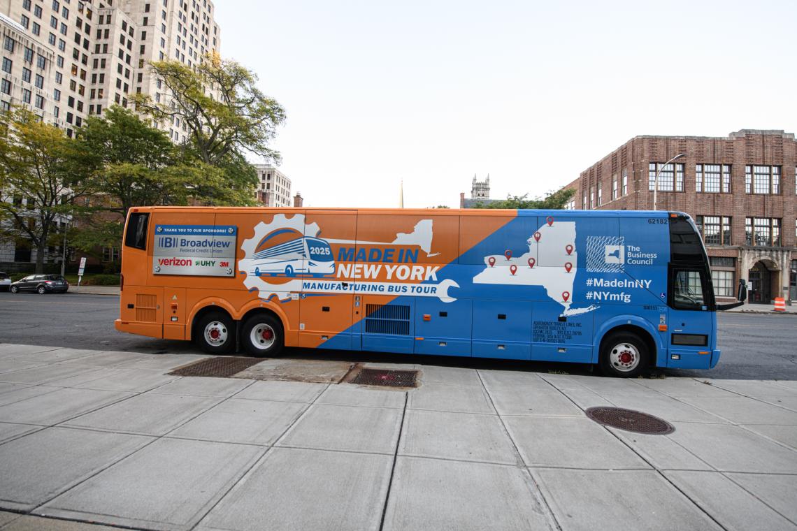 Made in NY Manufacturing Bus on street
